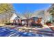This building has a red brick exterior and visitor parking spots in front for guests to use at 586 Windchase Ln, Stone Mountain, GA 30083