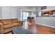 Comfortable living room flows into dining area, showcasing the open-concept layout at 586 Windchase Ln, Stone Mountain, GA 30083