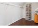 Organized walk-in closet with wire shelving and clear shoe boxes at 274 Westchester Club Dr, Hiram, GA 30141