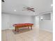 Spacious game room with tile flooring, a pool table, and a ceiling fan at 274 Westchester Club Dr, Hiram, GA 30141