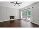 Bright living room features a white brick fireplace and large windows with natural light at 274 Westchester Club Dr, Hiram, GA 30141