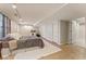 Finished basement with tile flooring, carpet and natural lighting at 607 Delphinium Nw Blvd, Acworth, GA 30102