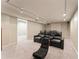 Modern theater room with plush carpet, tiered seating, and ambient lighting, perfect for immersive entertainment experiences at 607 Delphinium Nw Blvd, Acworth, GA 30102