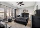 Comfortable bedroom with neutral walls, a ceiling fan, and ample space at 2722 Hallwood Ln, Suwanee, GA 30024