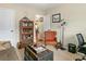 Comfortable bedroom setup with a cozy couch, wood storage chest, and ample lighting at 28 Butler Park Ct, Dallas, GA 30157