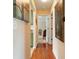 Hallway with wood floors and natural lighting at 28 Butler Park Ct, Dallas, GA 30157