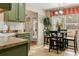 Eat-in kitchen with a window view and cozy dining set at 28 Butler Park Ct, Dallas, GA 30157