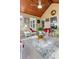 Sunroom featuring bright natural light, tile flooring, and comfortable seating for year-round enjoyment at 28 Butler Park Ct, Dallas, GA 30157