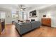 Comfortable living room features a fireplace, hardwood floors, and a flat screen TV at 714 Opera Ln, Alpharetta, GA 30009