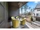 Outdoor patio featuring comfortable seating and a view of the landscaped surroundings at 714 Opera Ln, Alpharetta, GA 30009