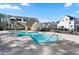 Community pool with a sprawling sundeck and inviting, crystal-clear water for summertime fun at 714 Opera Ln, Alpharetta, GA 30009