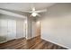Cozy bedroom with a ceiling fan and vinyl plank flooring at 1096 Liberty Nw Pkwy, Atlanta, GA 30318