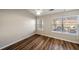 A sunlit bedroom features natural light and vinyl plank flooring throughout at 1096 Liberty Nw Pkwy, Atlanta, GA 30318