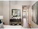 Bright bedroom with a console table and accent decor, complemented by wood-look flooring at 1096 Liberty Nw Pkwy, Atlanta, GA 30318