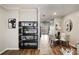 Cozy dining area with hardwood floors, modern light fixture, and access to the balcony at 1096 Liberty Nw Pkwy, Atlanta, GA 30318
