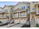 Charming townhome showcasing private garages, balconies, and inviting entryways at 1096 Liberty Nw Pkwy, Atlanta, GA 30318