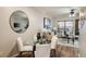 Bright and inviting living area with hardwood floors, ceiling fan, and modern furnishings at 1096 Liberty Nw Pkwy, Atlanta, GA 30318