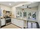 Modern kitchen with granite countertops and stainless steel appliances at 1111 Seaboard Nw Ave, Atlanta, GA 30318