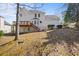 A spacious backyard, complete with a wooden deck, is great for outdoor enjoyment at 231 Beechwood Ln, Stone Mountain, GA 30087