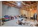 Unfinished basement with potential featuring exposed beams and concrete flooring at 231 Beechwood Ln, Stone Mountain, GA 30087
