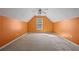 Spacious bedroom featuring vaulted ceiling, a ceiling fan, a window and carpet flooring at 231 Beechwood Ln, Stone Mountain, GA 30087