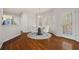 Bright dining area features a round table, white chairs and a door to the outside at 231 Beechwood Ln, Stone Mountain, GA 30087