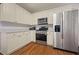 Well-equipped kitchen with stainless steel appliances and plenty of cabinet space at 231 Beechwood Ln, Stone Mountain, GA 30087