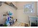 Utility room with a sink and shelving at 231 Beechwood Ln, Stone Mountain, GA 30087