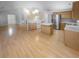 Open-concept kitchen with modern appliances, a center island, and seamless access to the living area at 1446 Dunton Green Way, Lawrenceville, GA 30043