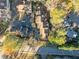 Birds-eye view of homes and landscaped neighborhood with tree-lined streets at 1532 Oak Grove Rd, Decatur, GA 30033