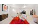Finished basement with white walls, tile flooring, and stylish modern furniture at 1532 Oak Grove Rd, Decatur, GA 30033