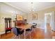 Cozy dining room with hardwood floors, a stylish table set, and elegant decorative touches at 1532 Oak Grove Rd, Decatur, GA 30033