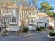 Charming townhome with a two-car garage, a well-maintained yard, and classic architectural details at 1532 Oak Grove Rd, Decatur, GA 30033