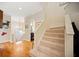 Inviting home foyer featuring hardwood floors, staircase, and neutral paint, creating a warm welcome at 1532 Oak Grove Rd, Decatur, GA 30033