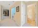 Well-lit hallway leads to the bathroom and main bedroom, with a laundry closet providing added convenience at 1532 Oak Grove Rd, Decatur, GA 30033
