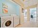 Convenient laundry room with modern appliances and ample space, making laundry tasks a breeze at 1532 Oak Grove Rd, Decatur, GA 30033