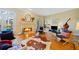 Charming living room featuring a fireplace, French doors and hardwood floors at 1532 Oak Grove Rd, Decatur, GA 30033