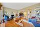 Bright living room boasting hardwood floors, comfortable seating, and unique decorative elements at 1532 Oak Grove Rd, Decatur, GA 30033