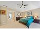 The main bedroom features a ceiling fan, ensuite bathroom, and a large window, ensuring a peaceful and relaxing retreat at 1532 Oak Grove Rd, Decatur, GA 30033