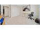 Functional office featuring a desk, chair, and closet with lots of carpeted room, perfect for a home workspace at 1532 Oak Grove Rd, Decatur, GA 30033