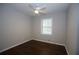 This bedroom offers hardwood floors and a ceiling fan at 2491 Hatfield Cir, Atlanta, GA 30316