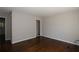 Neutral bedroom featuring hardwood floors and fresh paint at 2491 Hatfield Cir, Atlanta, GA 30316