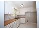 This kitchen boasts custom cabinets and butcher block countertops at 2491 Hatfield Cir, Atlanta, GA 30316
