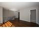 Open living area with freshly painted walls, hardwood floors, and stair access at 2491 Hatfield Cir, Atlanta, GA 30316