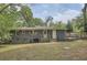 Backyard view of house showing the gray brick exterior and open yard at 2797 Gresham Se Rd, Atlanta, GA 30316
