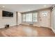 Bright living room featuring hardwood floors, large windows, and recessed lighting at 2797 Gresham Se Rd, Atlanta, GA 30316