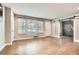 Cozy living room with hardwood floors, recessed lighting, and a modern barn door at 2797 Gresham Se Rd, Atlanta, GA 30316