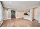 Open-concept living space with hardwood floors and a kitchen featuring modern finishes at 2797 Gresham Se Rd, Atlanta, GA 30316