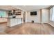 Bright, open living space connecting kitchen and living area with hardwood floors at 2797 Gresham Se Rd, Atlanta, GA 30316