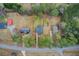 Aerial shot showcases the home's location, mature trees, large yards, and proximity to amenities at 335 Old Airport Rd, Carrollton, GA 30116